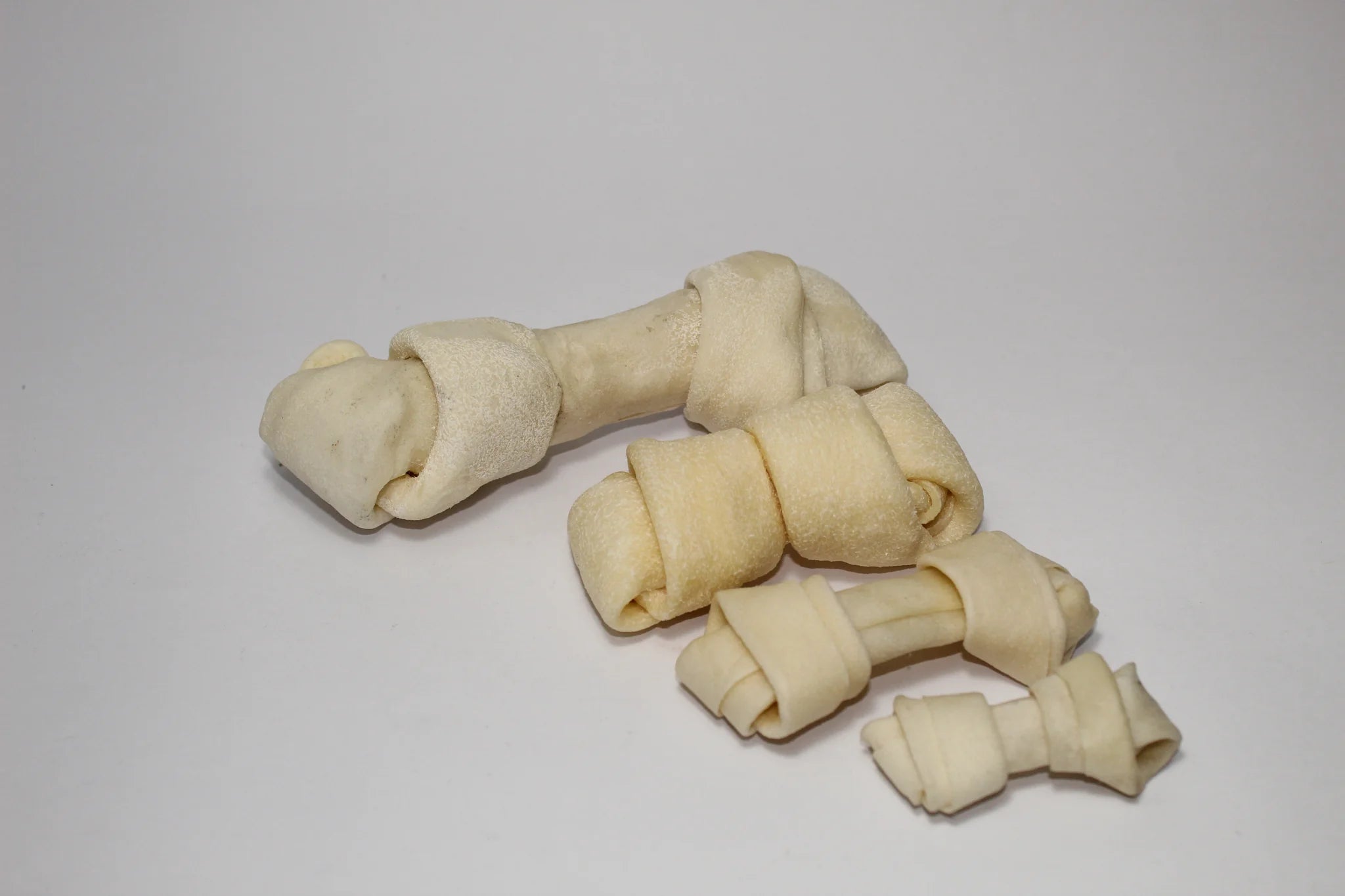 QP - Rawhide bone Singles